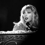 LOS ANGELES, CALIFORNIA - NOVEMBER 24: (EDITORS NOTE: Image has been converted to black and white) Taylor Swift performs onstage at the 2019 American Music Awards at Microsoft Theater on November 24, 2019 in Los Angeles, California. (Photo by Emma McIntyre/AMA2019/Getty Images for dcp)