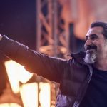 Serj Tankian, the Armenian-American leader of the band System of a Down, gestures to the crowd gathered at Yerevan's Republic Square on May 7, 2018. (Photo by Sergei GAPON / AFP)        (Photo credit should read SERGEI GAPON/AFP via Getty Images)