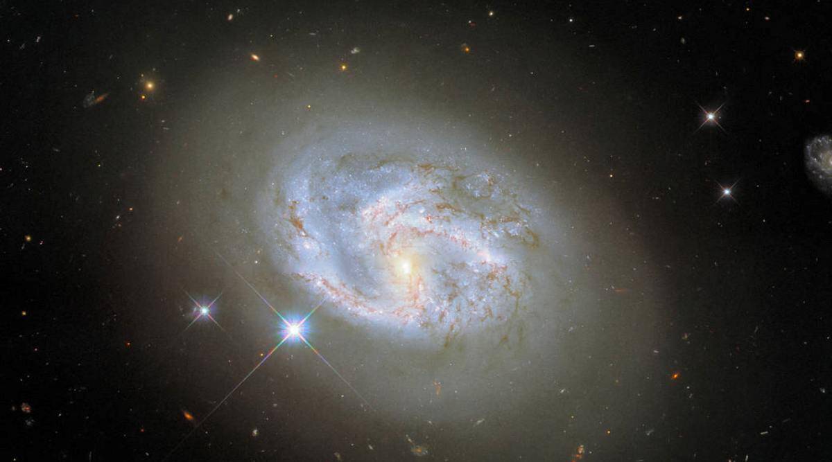 NASA, NASA spiral galaxy, NASA NGC 4680, NASA Hubble’s Wide Field Camera 3, NASA observations, spiral galaxy NGC 4680, NASA news,