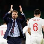 England manager Gareth Southgate applauds their fans after the match against Spain