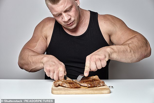 A los hombres les gusta comer más carne que las mujeres porque sienten que les ayuda a `` promulgar y afirmar su identidad masculina '', concluyó un estudio (imagen de stock)