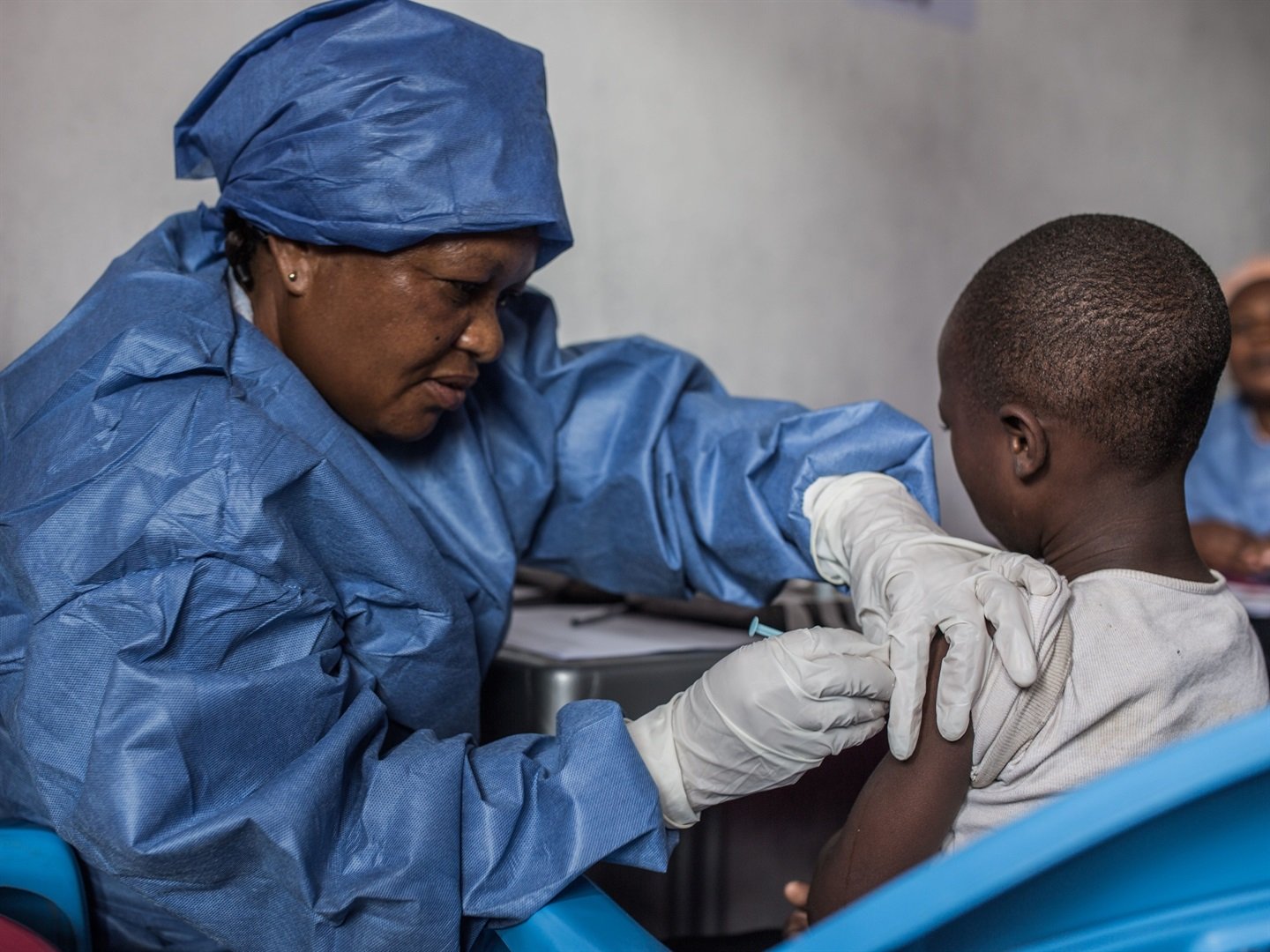 A girl gets inoculated with an Ebola vaccine on November 22, 2019 in Goma, the Democratic Republic of the Congo