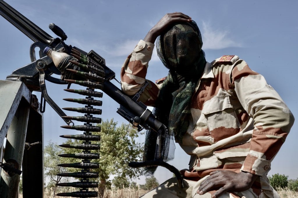 Niger Army soldier takes a breather during security patrol near the Nigerian border in Maradi State. The lawless borders with Nigeria and Mali continue to be hotbeds for Islamic Jihadist insurgents.