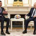 Vladimir Putin de Rusia atacó a Biden y condenó a las fuerzas estadounidenses `` ilegítimas '' en Siria en una reunión con el dictador Bashar al-Assad en Moscú anoche.