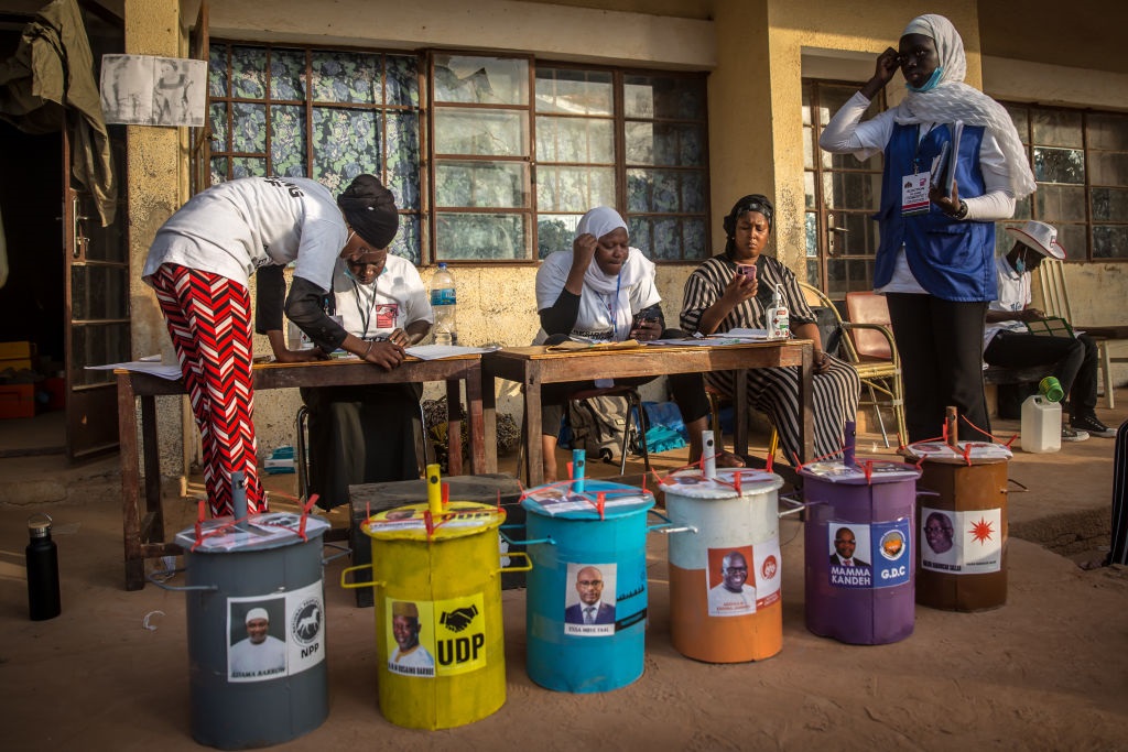 Officials at a polling station prepare to count votes in Gambias presidential election. (Photo by Sally Hayden/SOPA Images/LightRocket via Getty Images)