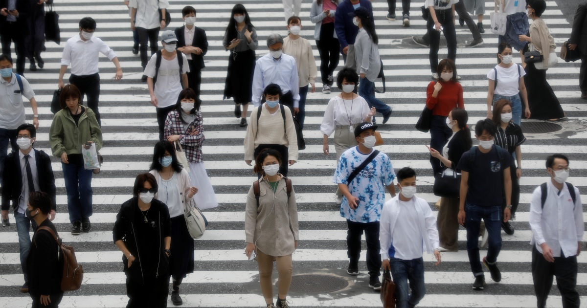 Omicron pide a Japón que trate el COVID como si fuera una gripe