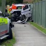 Dos personas resultaron gravemente heridas, incluido un oficial de policía, luego de un horrible choque frontal entre una camioneta de la policía y una ute en el norte de Brisbane.