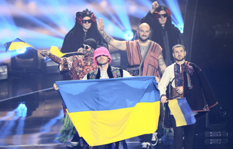 14 May 2022, Italy, Turin: The group Kalush Orchestra from Ukraine with the song "Stefania" enters the hall at the beginning of the final of the Eurovision Song Contest (ESC). The international music competition is held for the 66th time. In the final are 25 songs from the original 40 music entries. Photo: Jens Büttner/dpa (Photo by Jens Büttner/picture alliance via Getty Images)