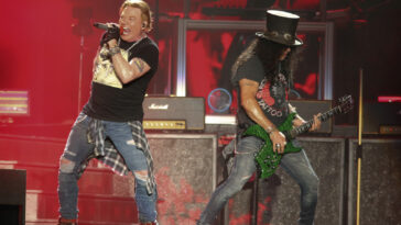 FILE - In this Oct. 4, 2019 file photo, Guns N' Roses' Axl Rose, left, and Slash perform on the first weekend of the Austin City Limits Music Festival at Zilker Park in Austin, Texas. Guns N’ Roses, Maroon 5, DJ Khaled and DaBaby will perform at the second annual Bud Light Super Bowl Music Fest, to take place Jan. 30 through Feb. 1 at AmericanAirlines Arena in Miami. (Photo by Jack Plunkett/Invision/AP, File)