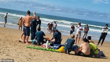 Un hombre de unos 30 años fue sacado del agua por socorristas y los paramédicos lo llevaron de urgencia al hospital después de casi ahogarse en Surfers Paradise Beach.