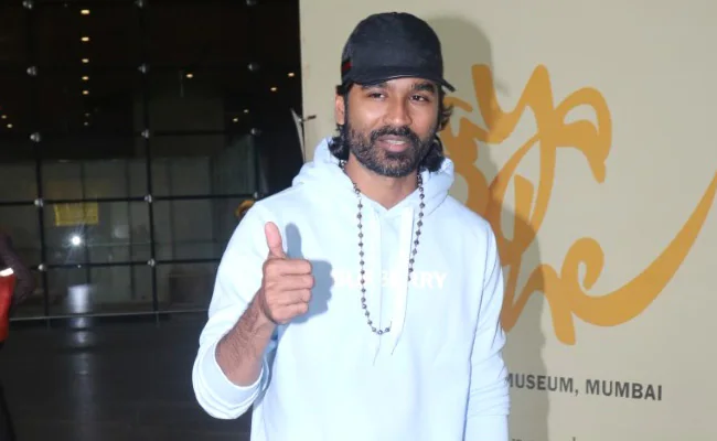 Ahead Of The Gray Man Mumbai Premiere, Dhanush And Joe Russo Pictured At The Airport