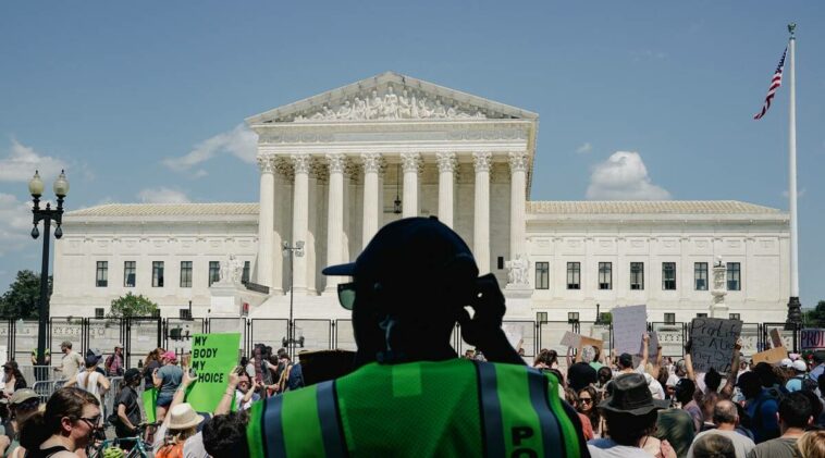 Demonstrations outside the Supreme Court building in Washington on the Sunday after Roe v. Wade was overturned, June 26, 2022. (Shuran Huang/The New York Times)