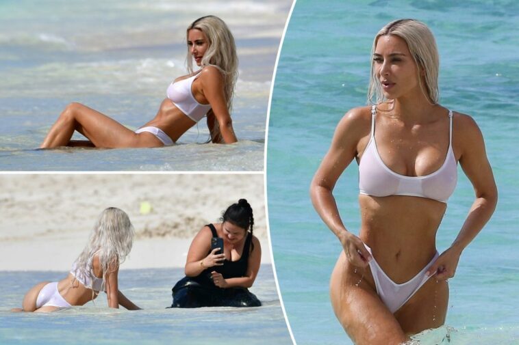 Kim Kardashian hace alarde de cuerpo de playa adelgazado en bikini blanco candente