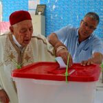 An elderly Tunisian man votes during a referendum on a draft constitution put forward by the country's President, at a polling station in Kasserine, on July 25, 2022.