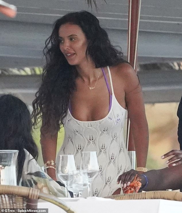 Glamour: Maya Jama se vistió para impresionar con un maxi vestido blanco de ganchillo mientras disfrutaba de una lujosa escapada a Ibiza el domingo