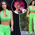 Megan Fox sale en verde neón para el concierto de MGK