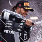 Lewis Hamilton, Mercedes, celebrates on the podium. Austria, July 2022.