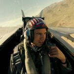 Tom Cruise flying a jet in Top Gun: Maverick
