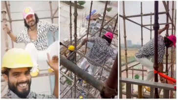 Vidyut Jammwal se baja de un andamio desde el balcón para hacer una selfie con un trabajador de la construcción, admiradores impresionados.  Reloj