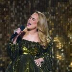 LONDON, ENGLAND - FEBRUARY 08: EDITORIAL USE ONLY Adele performs on stage during The BRIT Awards 2022 at The O2 Arena on February 08, 2022 in London, England. (Photo by Gareth Cattermole/Getty Images )