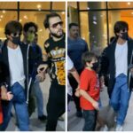 Fan intenta agarrar la mano de Shah Rukh Khan en el aeropuerto, Aryan Khan protege a papá.  Reloj