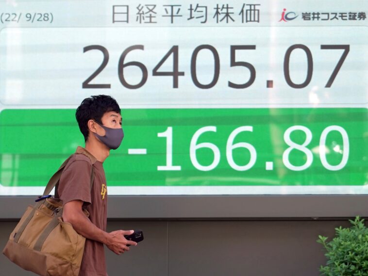 Acciones asiáticas caen tras día tambaleante en Wall Street