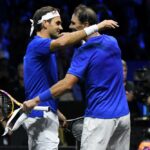 Roger Federer hugs Rafael Nadal