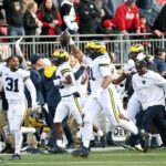Bolsa de valores de la semana 13 del fútbol americano universitario: Michigan enfrenta el desafío de frente