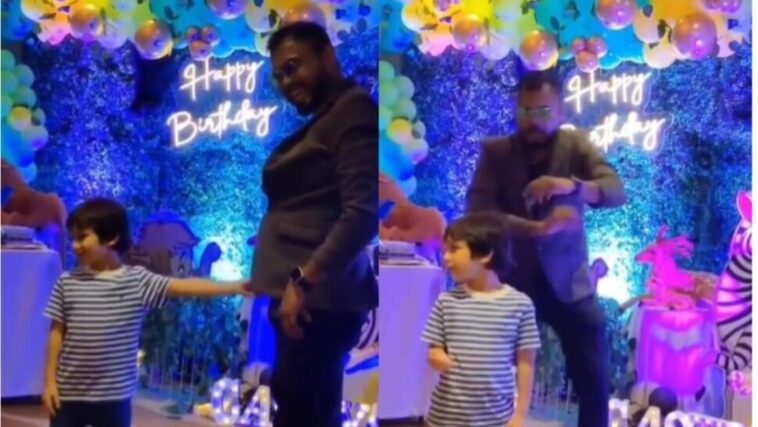 El desinteresado Taimur Ali Khan participa en un espectáculo de magia en la fiesta de cumpleaños de un amigo y sonríe cuando termina.  Reloj