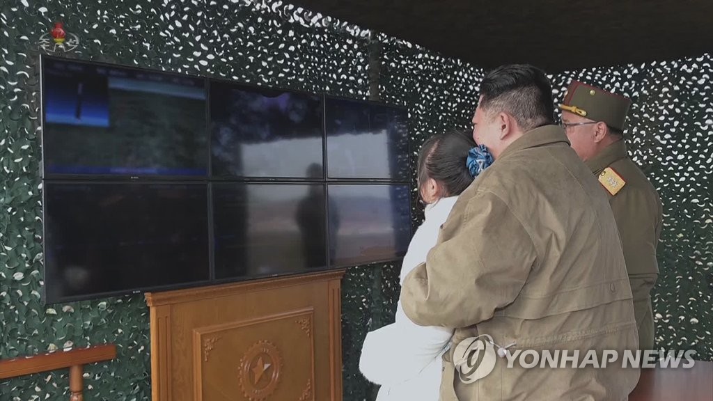 N.K. state TV releases photos of leader Kim, his daughter, for 2nd straight day