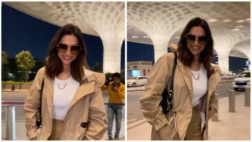 Deepika Padukone parece imperturbable por la fila de Besharam Rang, le da grandes sonrisas a los paparazzi en el aeropuerto