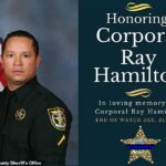 Cpl.  Ray Hamilton, de la Oficina del Sheriff del Condado de Okaloosa, era un veterano de cinco años en la fuerza y ​​sirvió en el Equipo de Respuesta Especial murió a causa de las heridas que sufrió en el tiroteo de Nochebuena.