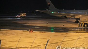 Heavy snow causes flight cancellations, road accidents
