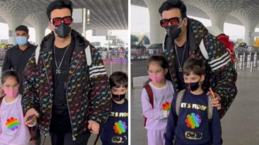 Los hijos de Karan Johar, Yash y Roohi, gemelos con atuendos a juego mientras salen del aeropuerto, los fanáticos los llaman 'bien educados'
