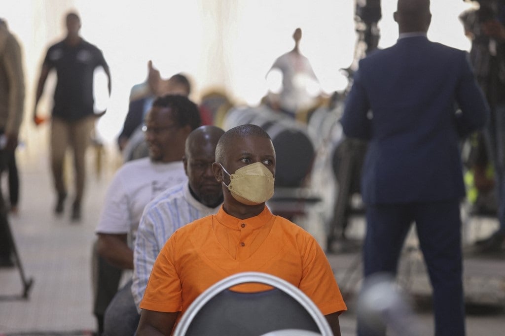 Armando Ndambi Guebuza, son of the former president of Mozambique Armando Guebuza, looks on during court proceedings in Maputo Central Prison, on 30 November, 2022.