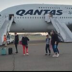 Un vuelo de Qantas que hizo un aterrizaje de emergencia en Azerbaiyán ha provocado retrasos en todo el mundo con familias que no saben si llegarán a casa para Navidad.