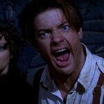Rachel Weisz watches scared while Brendan Fraser yells in The Mummy.