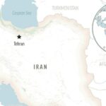Buque de carga tanzano vuelca en puerto iraní