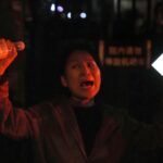 Madre dice que manifestante chino fue liberado tras 30 días de detención