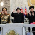 (4th LD) N. Korean leader attends military parade; ICBMs on display