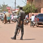 In this file photo taken on October 29, 2018 shows a policeman patrolling in the center of Ouahigouya, eastern Burkina Faso.