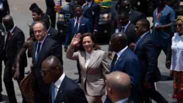 US Vice President Kamala Harris waves upon her arrival at the Kotoka International Airport on March 26, 2023 in Accra, Ghana.