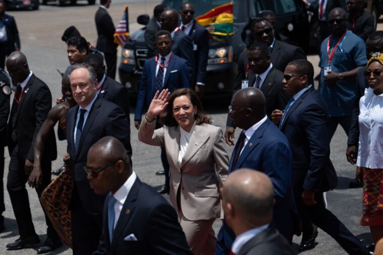 US Vice President Kamala Harris waves upon her arrival at the Kotoka International Airport on March 26, 2023 in Accra, Ghana.