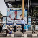Campaign posters of the All Progressive Congres (APC) candidates at a bus stop in Lagos Island. (Photo by Benson Ibeabuchi/Getty Images)