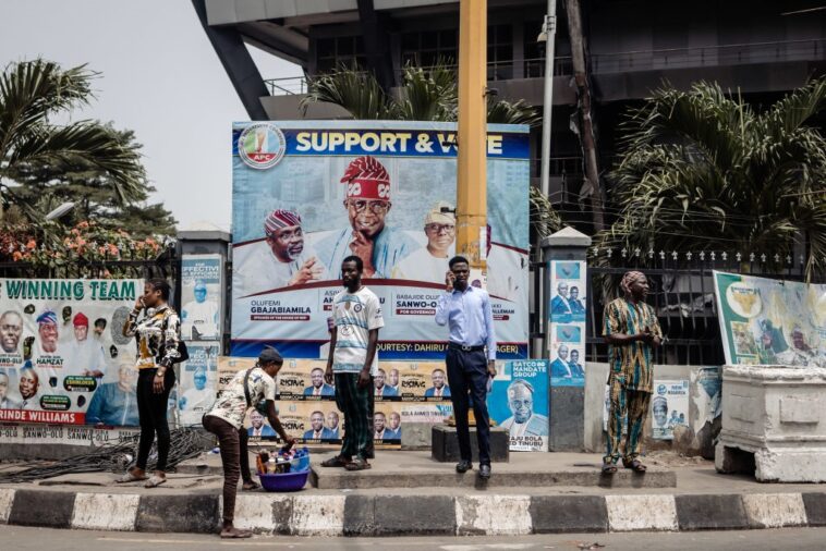 Campaign posters of the All Progressive Congres (APC) candidates at a bus stop in Lagos Island. (Photo by Benson Ibeabuchi/Getty Images)