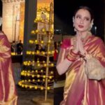 Rekha posa frente a la Puerta de la India para el desfile de Christian Dior en Bombay.  Mirar