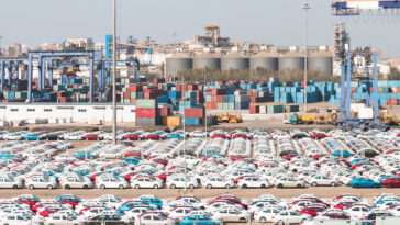 Cars await export in Chinese port credit: Shutterstock