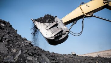 Minergy has had to down scale operations as coal prices fall.