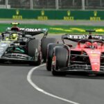 Ferrari's Monegasque driver Charles Leclerc (R) and Mercedes' British driver Lewis Hamilton drive