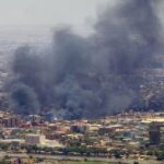Smoke billows during fighting in the Sudanese capital Khartoum.